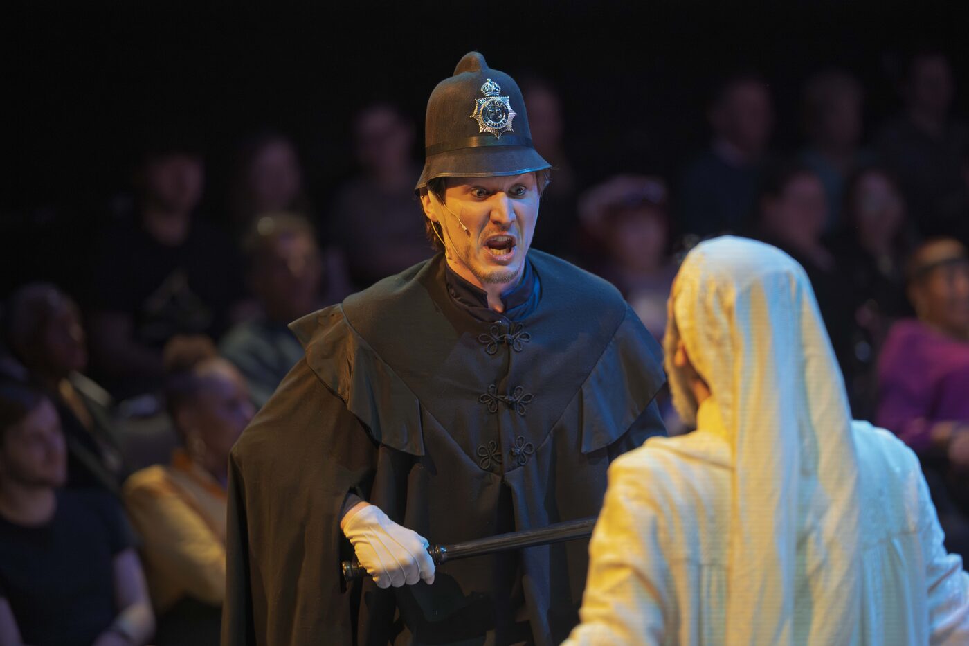 Intense confrontation with a hooded figure