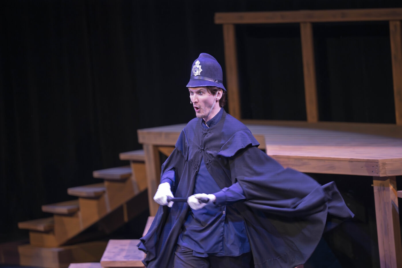 Mid-action, cape flowing
