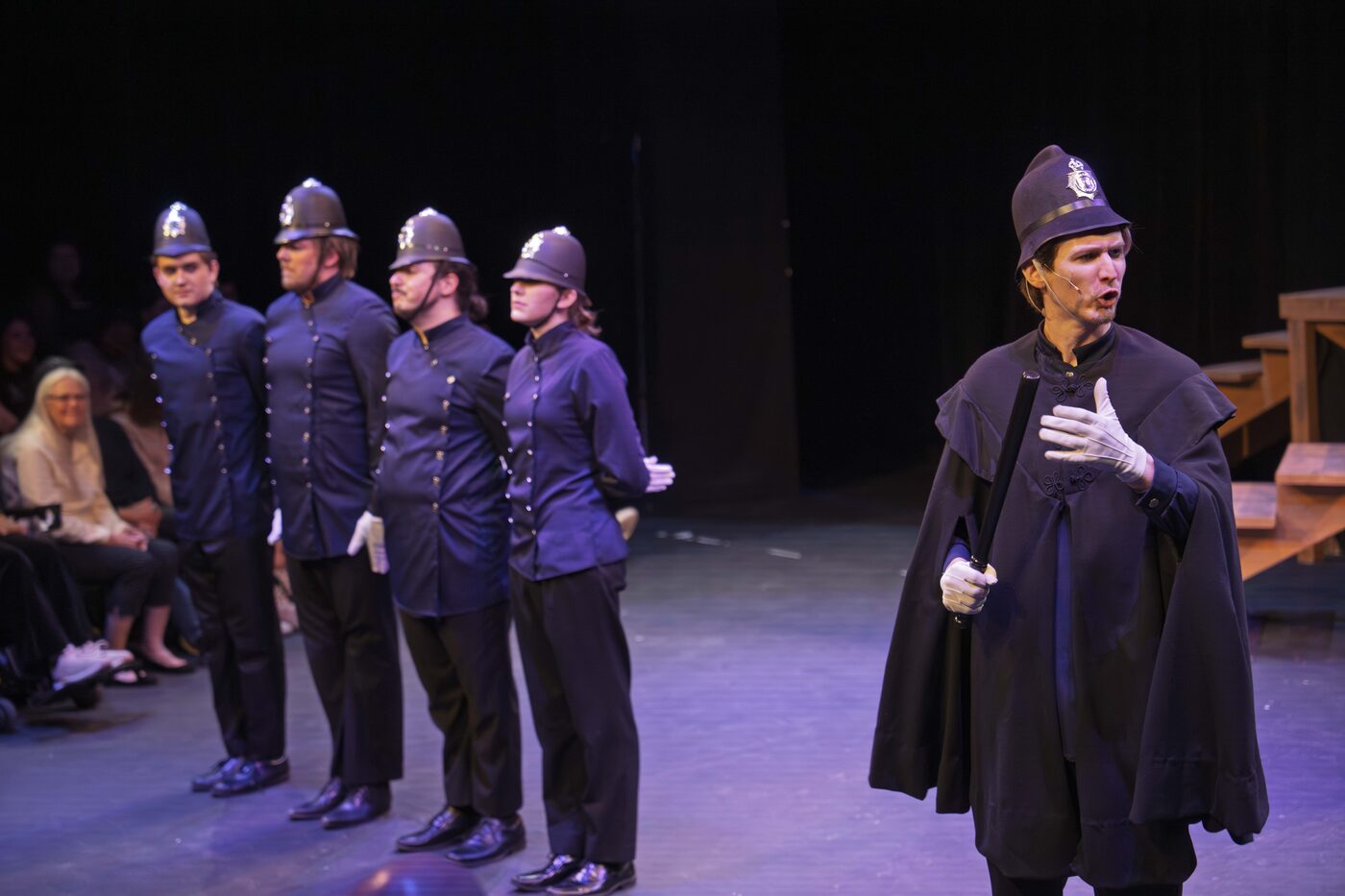 Police lineup, sergeant standing apart